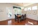 Breakfast nook featuring a table with seating, natural light from large windows and access to screened in porch at 3102 Arches Bluff Cir, Lancaster, SC 29720