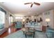 Open-concept living area with a seamless transition to the dining and kitchen spaces, featuring stylish decor at 3102 Arches Bluff Cir, Lancaster, SC 29720