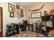 Office with a desk, chair, shelves and decor at 3102 Arches Bluff Cir, Lancaster, SC 29720