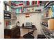 Cozy office nook featuring built-in shelving for efficient storage and organization at 3102 Arches Bluff Cir, Lancaster, SC 29720
