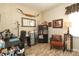 Office with a desk, chair, shelves and decor at 3102 Arches Bluff Cir, Lancaster, SC 29720
