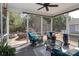 Inviting screened porch with outdoor seating for enjoying peaceful views and fresh air at 3102 Arches Bluff Cir, Lancaster, SC 29720