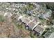 Aerial view featuring neighborhood, pond and well-maintained landscaping at 3104 Streamhaven Dr, Indian Land, SC 29707