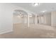 Spacious open basement featuring recessed lighting, plush carpeting and neutral paint at 3104 Streamhaven Dr, Indian Land, SC 29707