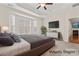 Comfortable, virtually staged bedroom offers a calm and relaxing atmosphere at 3104 Streamhaven Dr, Indian Land, SC 29707