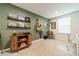 Stylish bedroom with a guitar, records, and an olive green wall at 3104 Timber Mill Dr, Matthews, NC 28104