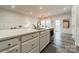 Bright kitchen boasts a spacious center island with stainless steel appliances and ample countertop space at 3104 Timber Mill Dr, Matthews, NC 28104