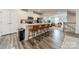 Bright kitchen features a large island with seating and stainless steel appliances at 3104 Timber Mill Dr, Matthews, NC 28104
