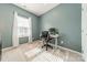 Home office space featuring modern desk and chair, natural light and a neutral colored carpet at 3104 Timber Mill Dr, Matthews, NC 28104
