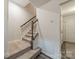 Stairway with carpeted steps and wood accents at 3104 Timber Mill Dr, Matthews, NC 28104