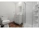 Bathroom equipped with updated vanity and fixtures, plus a walk-in shower, creating a practical and modern space at 326 Whispering Pines Dr, Charlotte, NC 28217