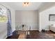 Cozy dining area with natural lighting and dark wood floors at 326 Whispering Pines Dr, Charlotte, NC 28217