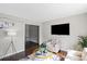 Cozy living room with a flat screen TV and stylish decor at 326 Whispering Pines Dr, Charlotte, NC 28217
