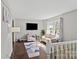Bright living room with stylish furnishings and hardwood flooring at 326 Whispering Pines Dr, Charlotte, NC 28217