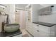 Bathroom featuring vessel sink, granite countertops, and walk-in shower at 36 Yorktown Nw St, Concord, NC 28025