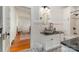 Bathroom featuring vessel sink, granite countertops, walk-in shower and adjacent bedroom access at 36 Yorktown Nw St, Concord, NC 28025