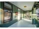 Cozy porch showcasing classic design with views of front yard and neighborhood; natural light through large windows at 36 Yorktown Nw St, Concord, NC 28025