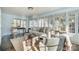 Bright sunroom featuring large windows, comfortable seating, and neutral décor at 36 Yorktown Nw St, Concord, NC 28025