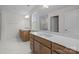 Modern bathroom features double sinks, wood cabinets, and a glass-enclosed shower at 4127 Walking Ridge Rd # 53, Charlotte, NC 28208