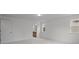 Bright bedroom featuring an en suite bathroom, neutral carpet, and a sunlit window at 4127 Walking Ridge Rd # 53, Charlotte, NC 28208