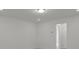 A bright, neutral bedroom featuring recessed lighting, white walls, and simple trim at 4127 Walking Ridge Rd # 53, Charlotte, NC 28208