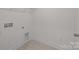 Bright laundry room with tile floors and utility connections for laundry appliances at 4127 Walking Ridge Rd # 53, Charlotte, NC 28208