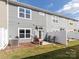 Backyard featuring a small patio, lush green grass, and a privacy fence at 426 Kenwood Vw, Indian Trail, NC 28079