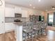 Modern kitchen with white cabinets, granite countertops, and stainless steel appliances at 426 Kenwood Vw, Indian Trail, NC 28079