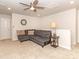 Relaxing living room space with plush seating, a ceiling fan, and neutral carpeting at 426 Kenwood Vw, Indian Trail, NC 28079