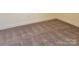 Comfortable bedroom with soft carpet and white trim at 4612 Waterbell Ln, Waxhaw, NC 28173