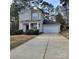 Traditional two-story home with a spacious driveway, a two-car garage, and a well-manicured front lawn at 4612 Waterbell Ln, Waxhaw, NC 28173