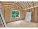 New home construction featuring a window view and a new bath tub leaned up against the wall at 5005 County Home Rd, Conover, NC 28613