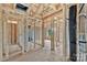 Unfinished bedroom shows the wall and ceiling construction, framing of a closet, and a window at 5005 County Home Rd, Conover, NC 28613