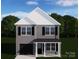 Charming two-story home with gray siding, black shutters, and a covered front porch, set against a backdrop of lush trees at 5005 County Home Rd, Conover, NC 28613