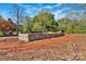 A concrete foundation on a lot surrounded by trees, suggesting a blend of natural beauty and a solid start for a new home at 5005 County Home Rd, Conover, NC 28613