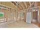 New construction featuring framed walls and a new bath tub leaned up against the wall at 5005 County Home Rd, Conover, NC 28613