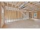 Unfinished living room showing wall and ceiling construction with stairs to upper level at 5005 County Home Rd, Conover, NC 28613