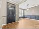 Entryway with hardwood flooring, decorative molding, and natural light through a window at 5959 Pale Moss Ln, Charlotte, NC 28269