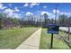 Scenic view of Campbell Creek Greenway, featuring a paved trail and lush greenery at 6823 City View Dr, Charlotte, NC 28212
