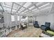 Cozy patio with comfortable seating, a bright rug, string lights and white curtains, perfect for relaxation at 6823 City View Dr, Charlotte, NC 28212