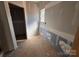 Bathroom under construction featuring a window for natural light and updated plumbing fixtures at 713 Inwood Hill Dr # 96, Gastonia, NC 28056