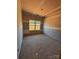 Unfinished bedroom with natural light streaming through the window, awaiting personalization and final touches at 713 Inwood Hill Dr # 96, Gastonia, NC 28056