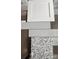 Selection of gray finishes including cabinets, floor tiles, and countertop granite for modern renovation at 713 Inwood Hill Dr # 96, Gastonia, NC 28056