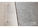 Sample of new grey wood flooring and carpet; ideal choices for stylish home interiors at 713 Inwood Hill Dr # 96, Gastonia, NC 28056