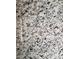 Close-up of speckled granite slab, showing its unique pattern and texture, ideal for countertops at 713 Inwood Hill Dr # 96, Gastonia, NC 28056