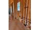Interior view of construction with framing and new piping for plumbing and electrical at 713 Inwood Hill Dr # 96, Gastonia, NC 28056