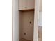 Compact storage area or pantry with a single cabinet above, awaiting shelving or other storage solutions at 713 Inwood Hill Dr # 96, Gastonia, NC 28056