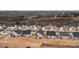 An aerial view of a neighborhood with modern houses, orderly lawns, and consistent design elements at 7172 Indigo Way, Denver, NC 28037