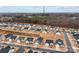 An aerial view of a residential area with orderly landscaping and modern homes and neighborhood streets at 7172 Indigo Way, Denver, NC 28037