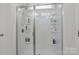 Shower with glass door and shelves for toiletries at 7172 Indigo Way, Denver, NC 28037